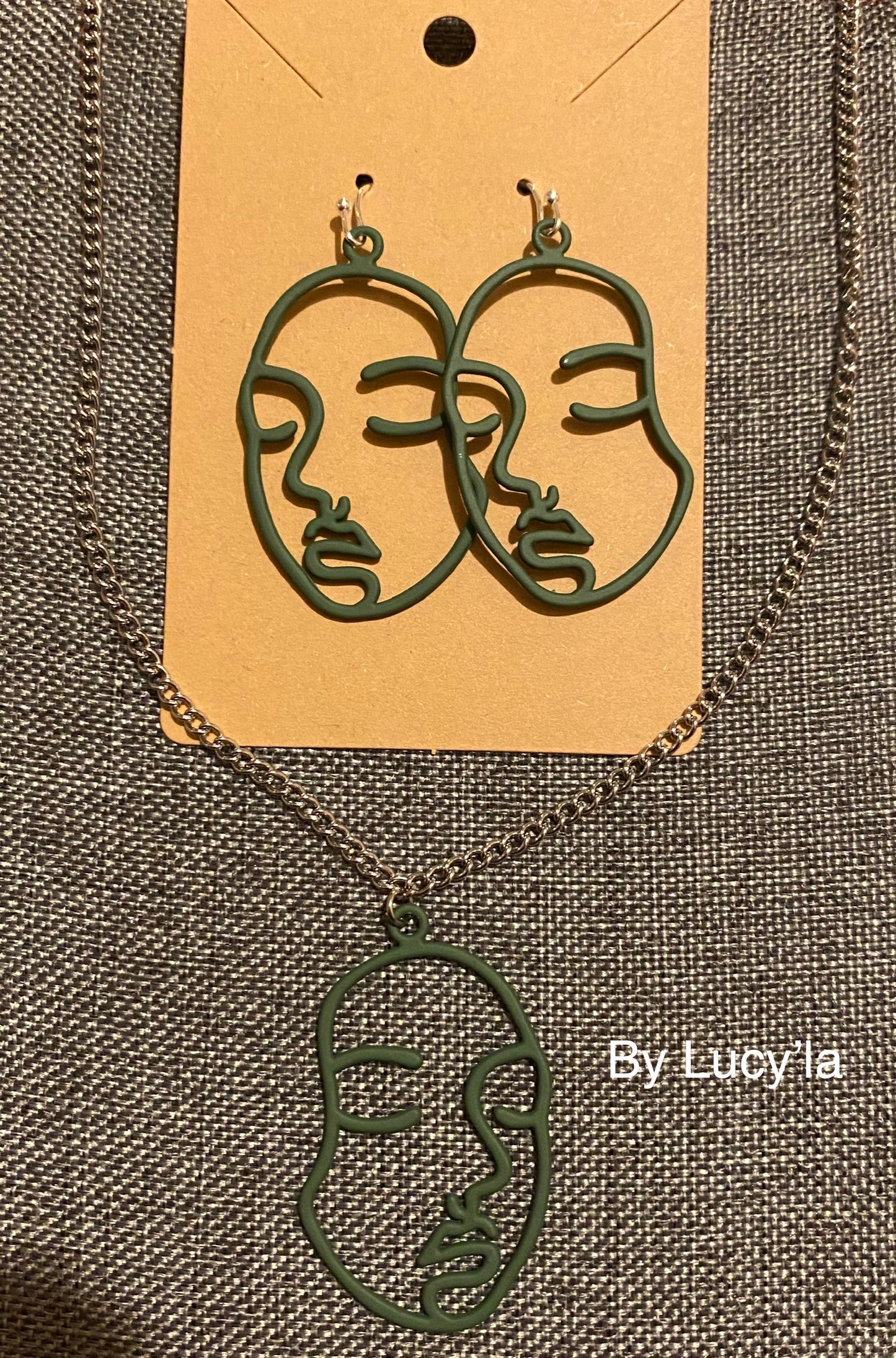 Green face set earrings and necklace