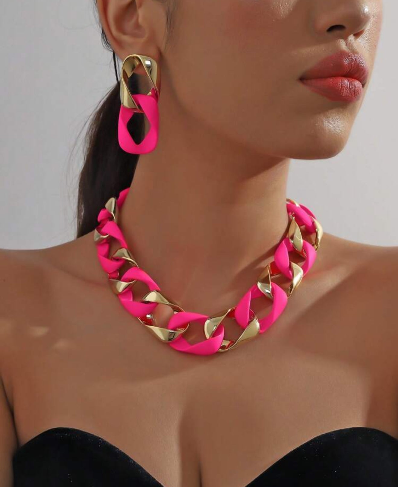 Hard pink necklace and earrings