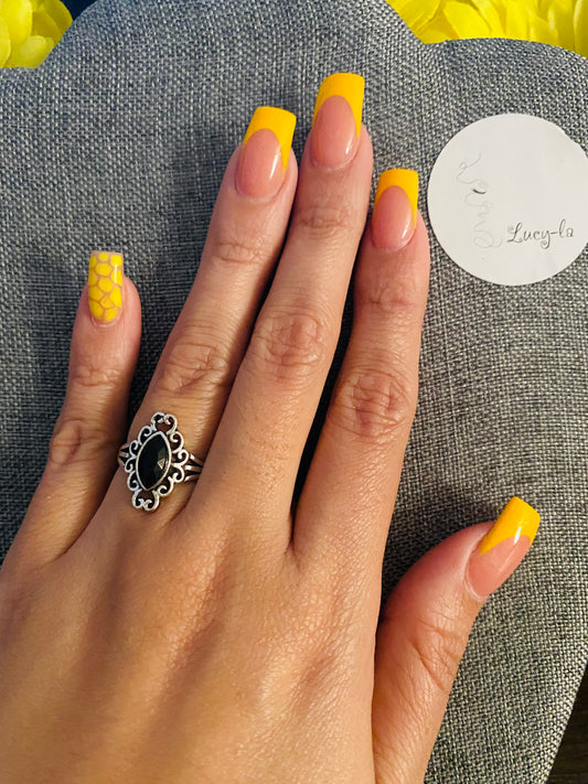 Ring with black stone